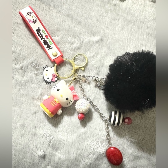 Hello Kitty Accessories - Hello Kitty Pink, Red & Black Pom-Pom Bag Charm